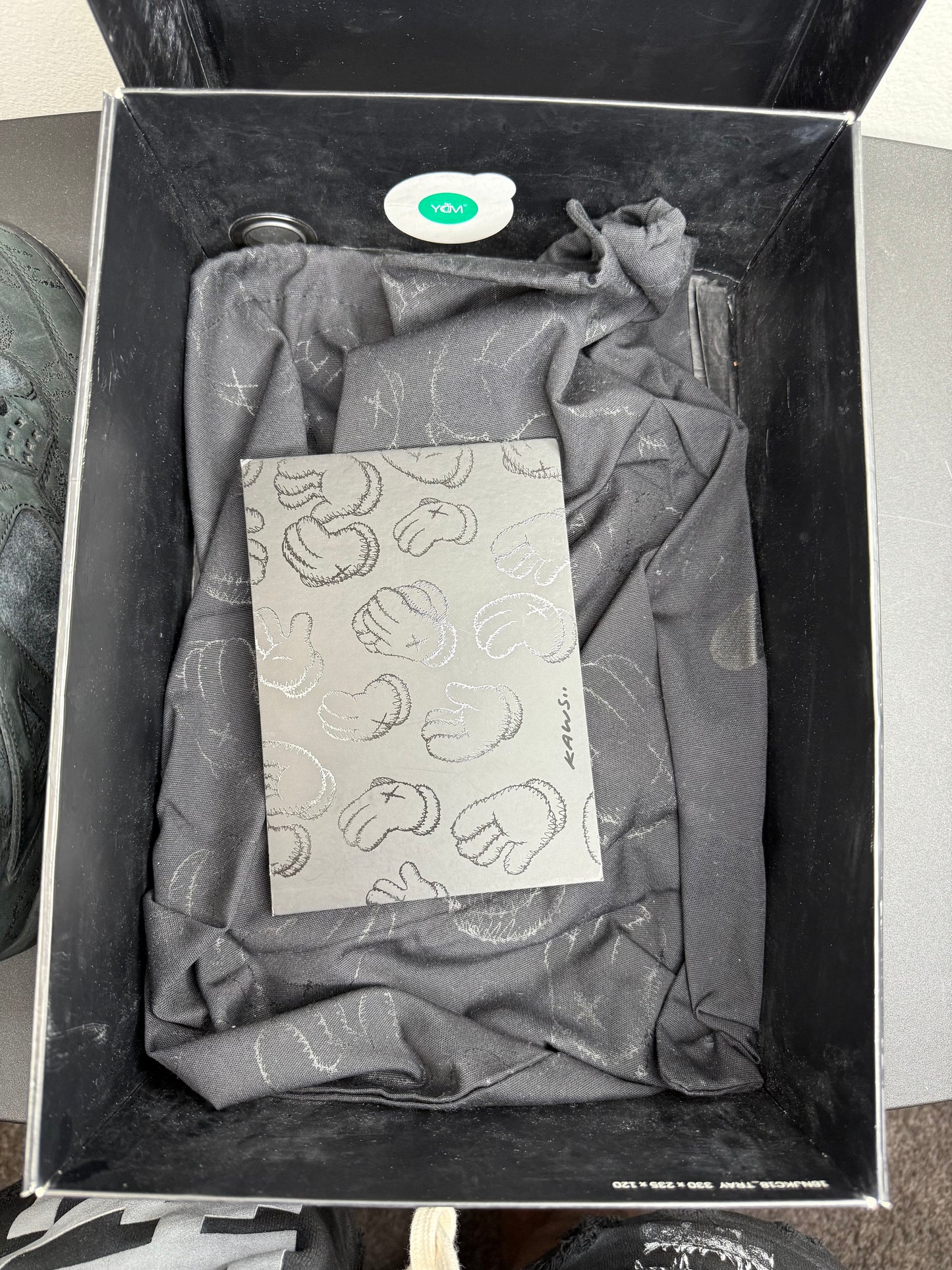 Air Jordan 4 Retro X KAWS (Black) (Preowned)