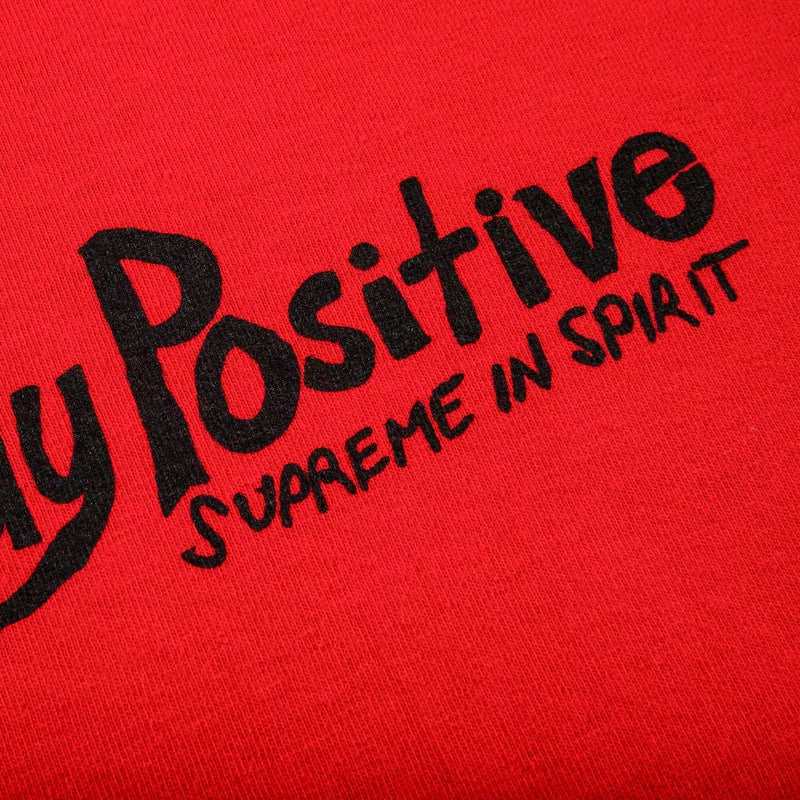 Supreme “Stay Positive” Tee (Red)